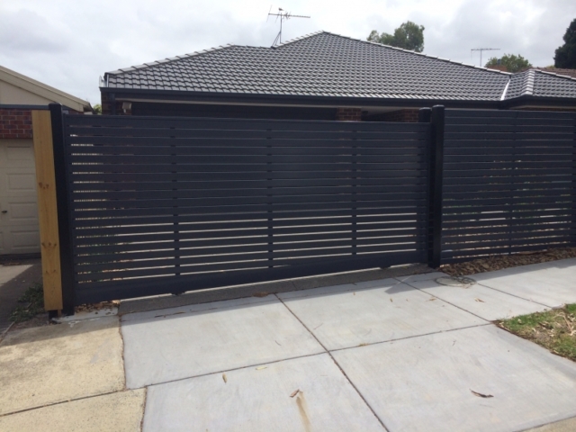 Automated sliding gate and fence - timber Automated sliding gate and fence - timber