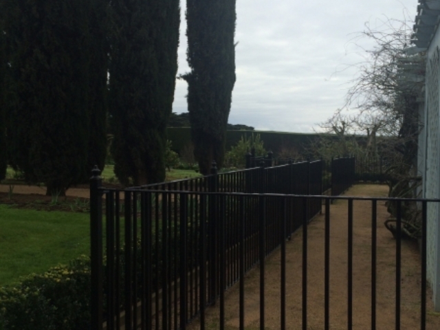 Black wrought iron pool fence Black wrought iron pool fence