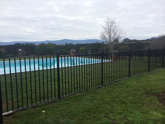 Black wrought iron pool fence Black wrought iron pool fence