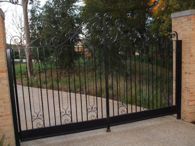 Black wrought iron swing gates Black wrought iron swing gates