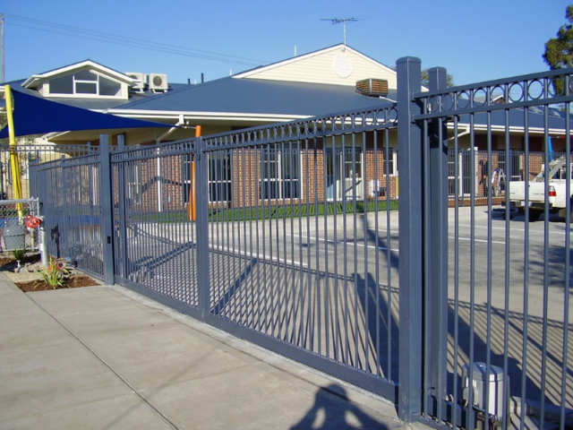 Twin automated electric sliding gates - steel Twin automated electric sliding gates - steel