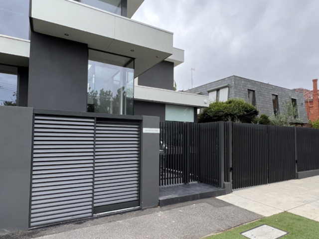 Aluminium blade fence with security gate and driveway swing gate - Brighton custom-aluminium-blade-fence-security-gate
